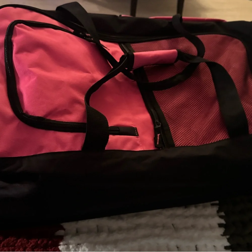 Pink and Black Garment Bag with Wheels 30” long• 16” wide• 14” high